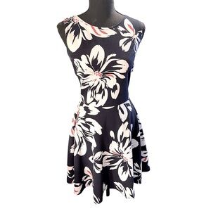 AQUA Sleeveless Skater Style‎ Dress Navy Blue White a Large White Flower Print.
